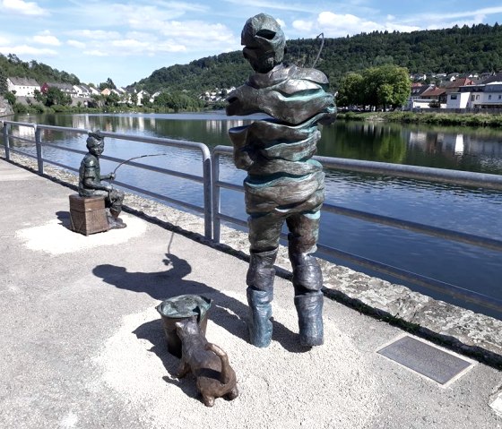 De Fëscher mat Katz, © Deutsch Luxemburgische Tourist Info De Fëscher mat Katz, © Deutsch Luxemburgische Tourist Info